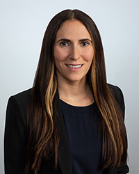 Woman with long hair, black top