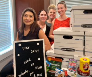 Image of Sessums Black firm members participating in donation drive.