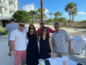 Group of people posing outdoors